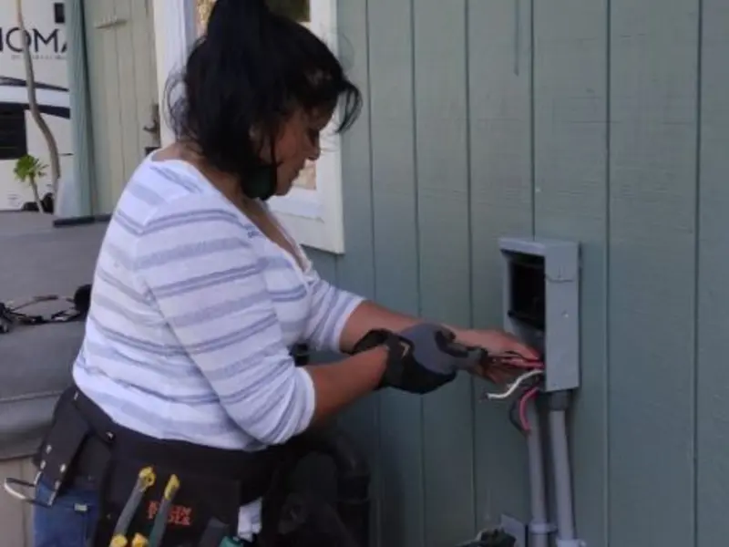 Licensed electrician wiring an exterior subpanel in La Presa